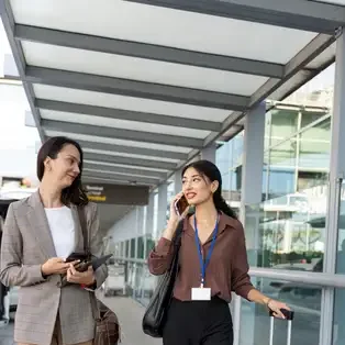 two-businesswomen-at-the-airport-terminal-commerc-2025-03-10-15-49-08-utc_result